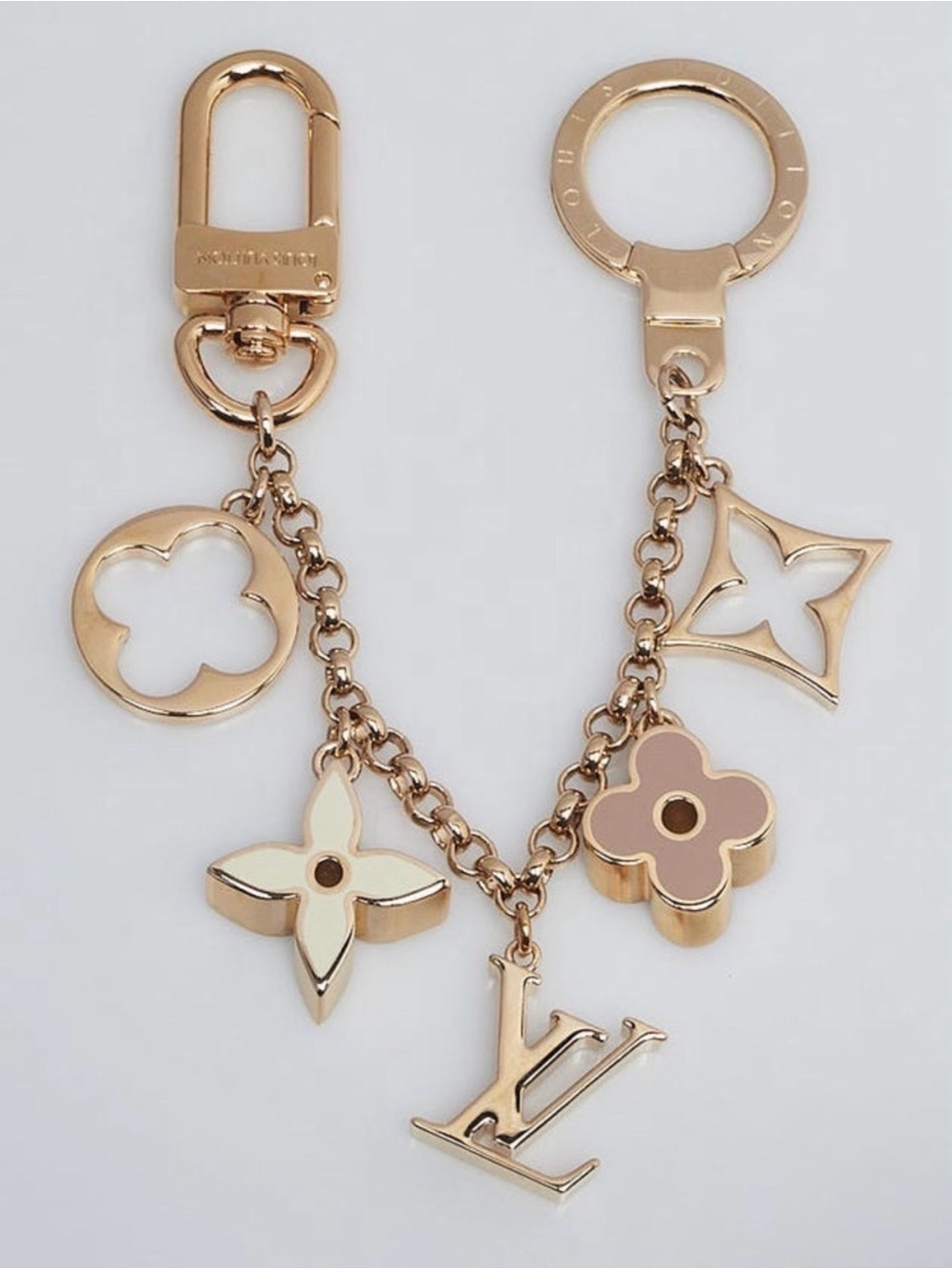 ✨ Authentic Louis Vuitton Fleur de Monogram Bag Charm in gold finished brass ✨